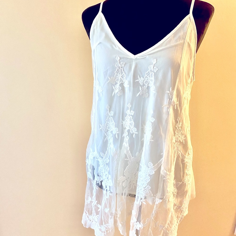 White top embroidered front. Never worn!